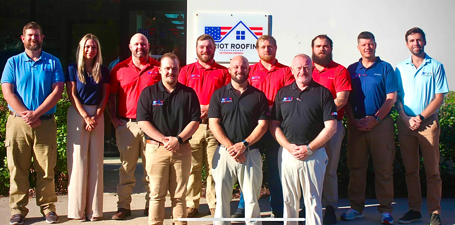 /wp-content/uploads/2024/11/group-photo-of-patriot-roofing-employees.webp